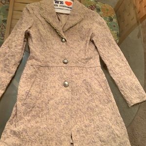 Cream colored Papillon brand coat size small. Never worn.